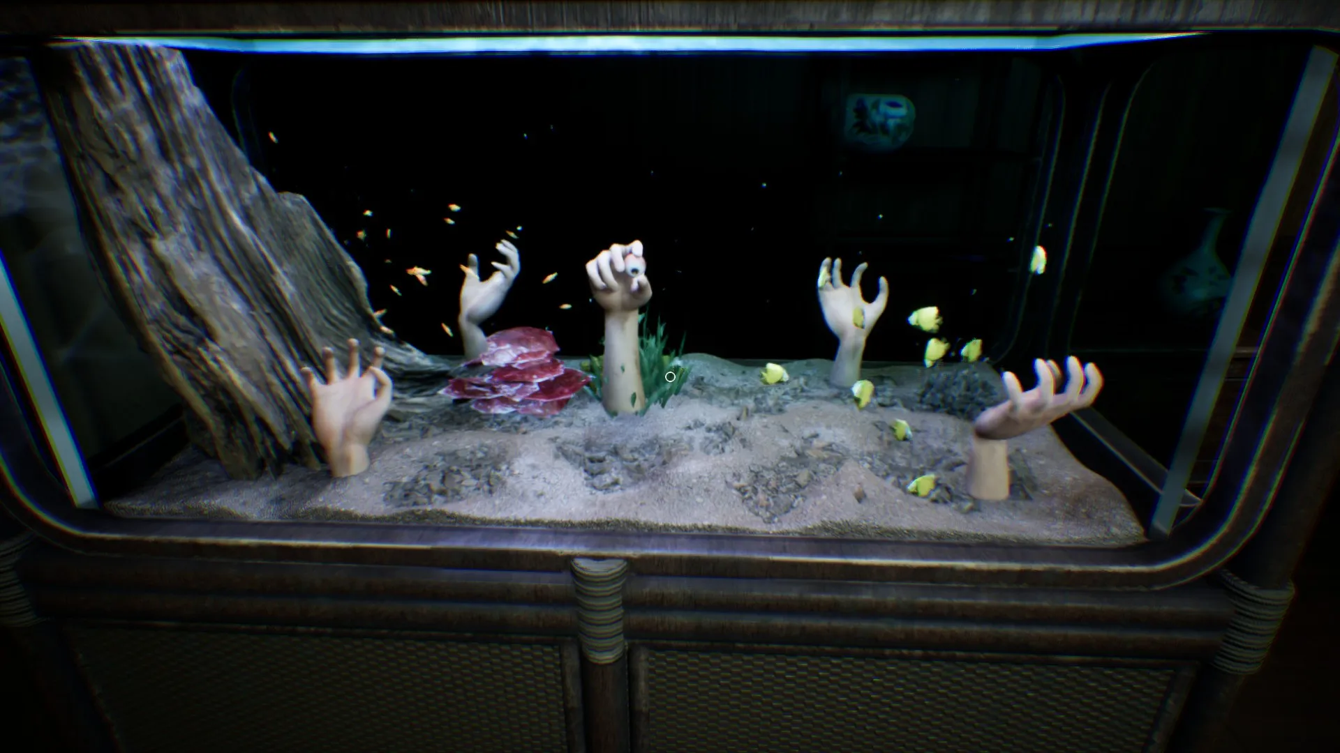 View of Mori's doll is obstructed by a plant.