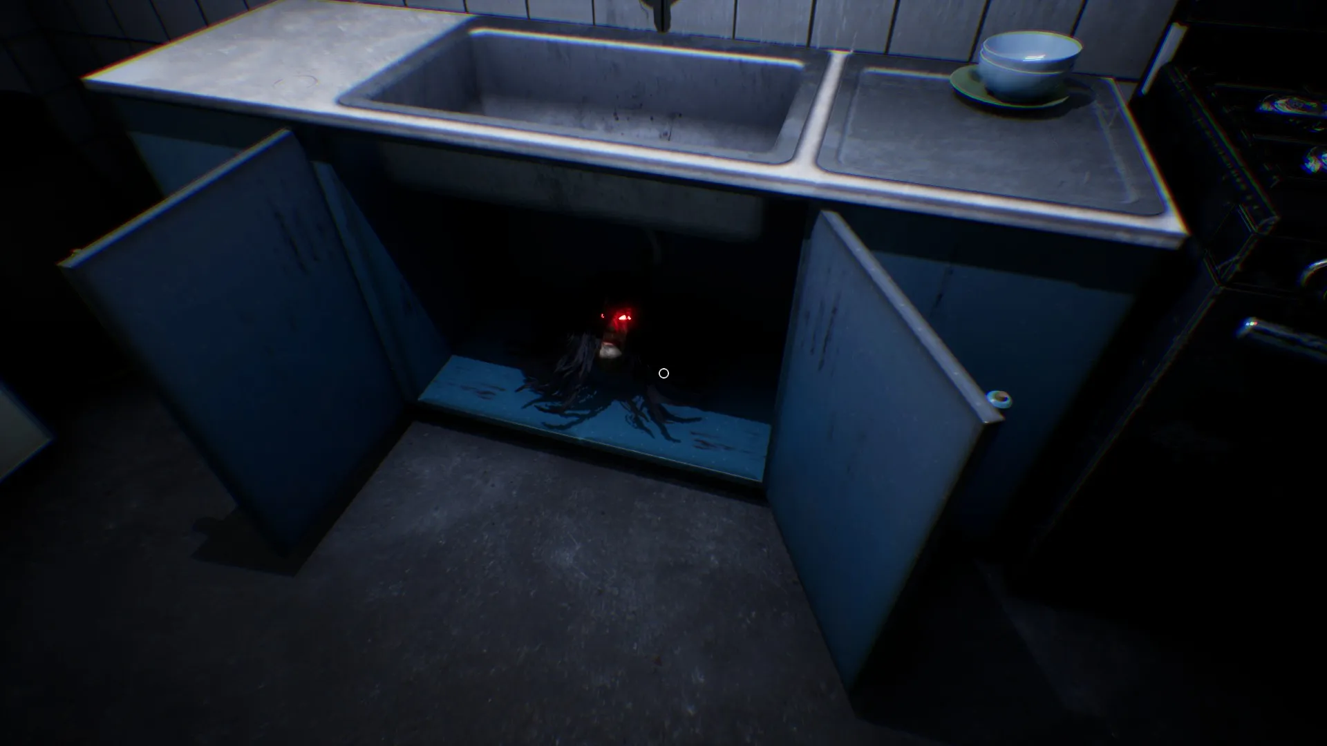 A head under the kitchen sink, the start of the moving lamp hallucination.